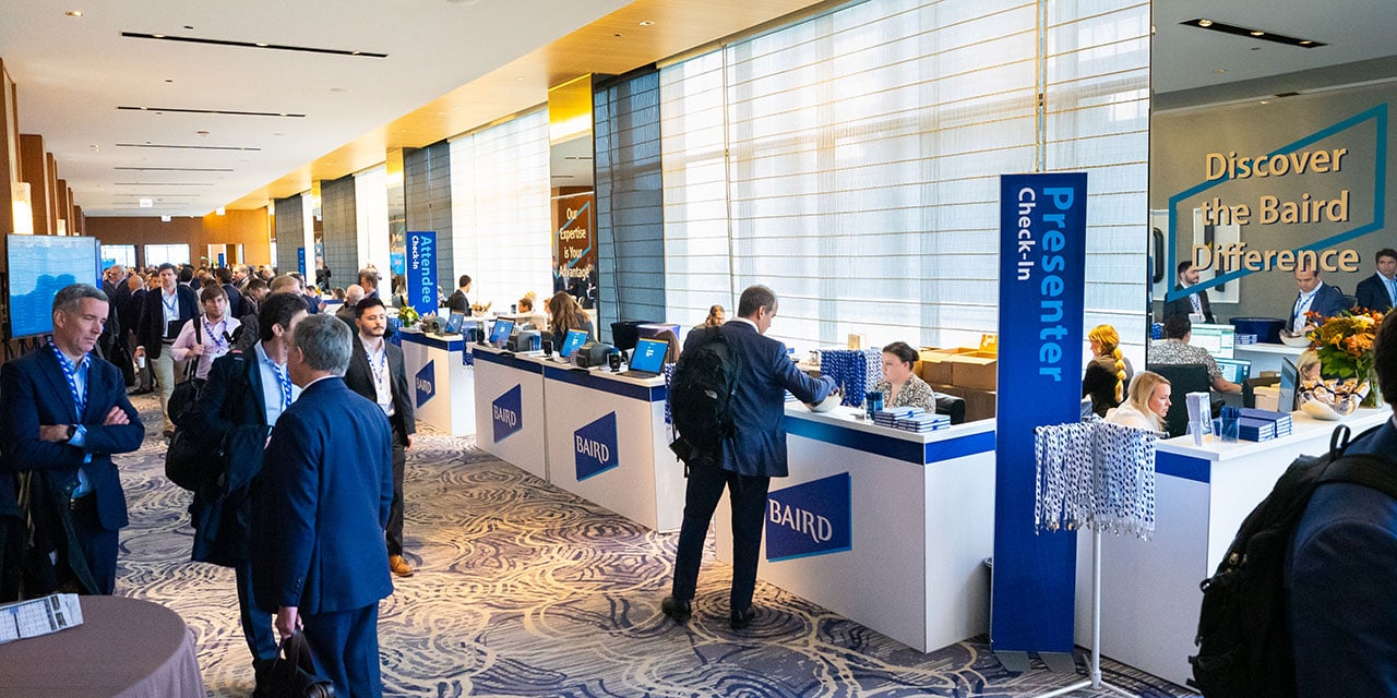 Attendees in the check-in area of a RJF Pro Conference