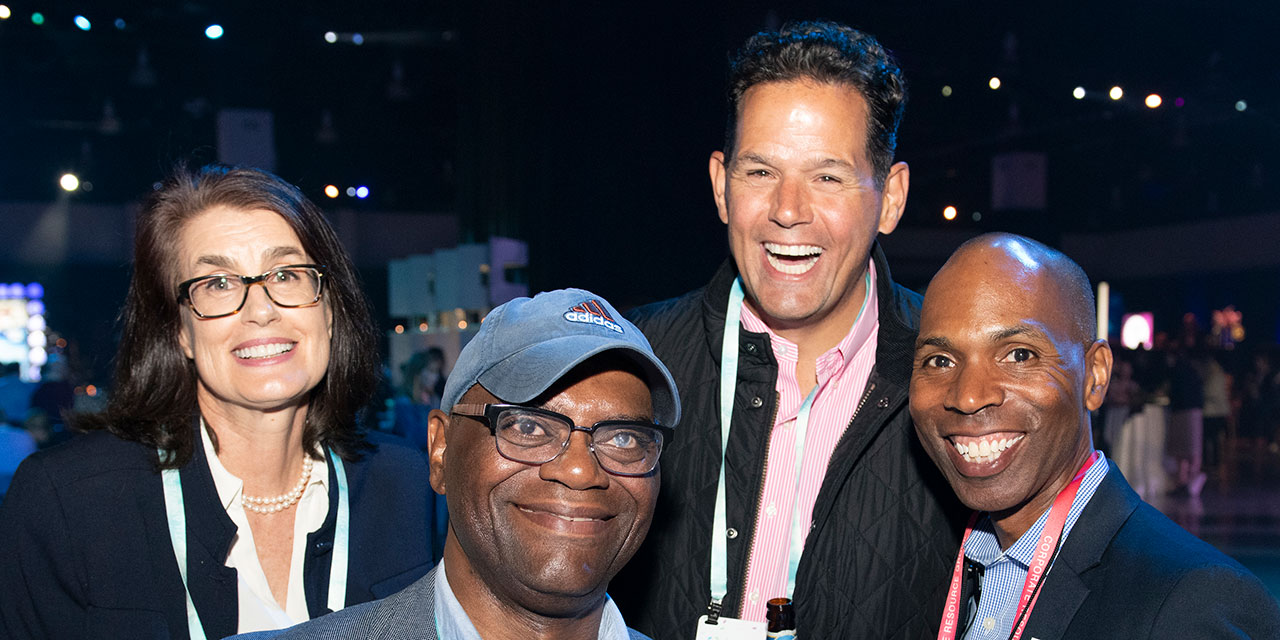 Four RJF Pro Associates posting together at RJF Pro event.